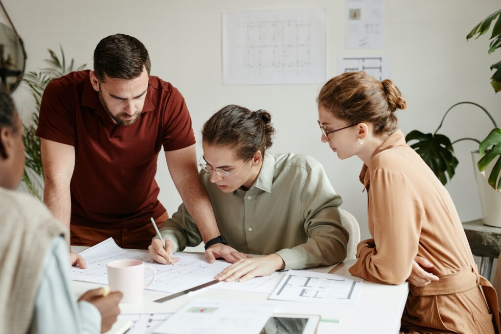 Team of Architects in Meeting